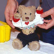 Teddy Bear getting ready for a bath